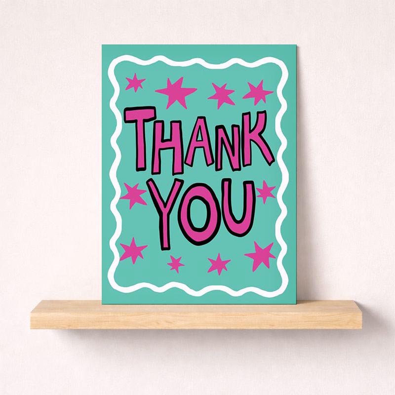 Pink and black thank you card with stars and "thank you" text on a lovely background. Perfect for showing appreciation with style.