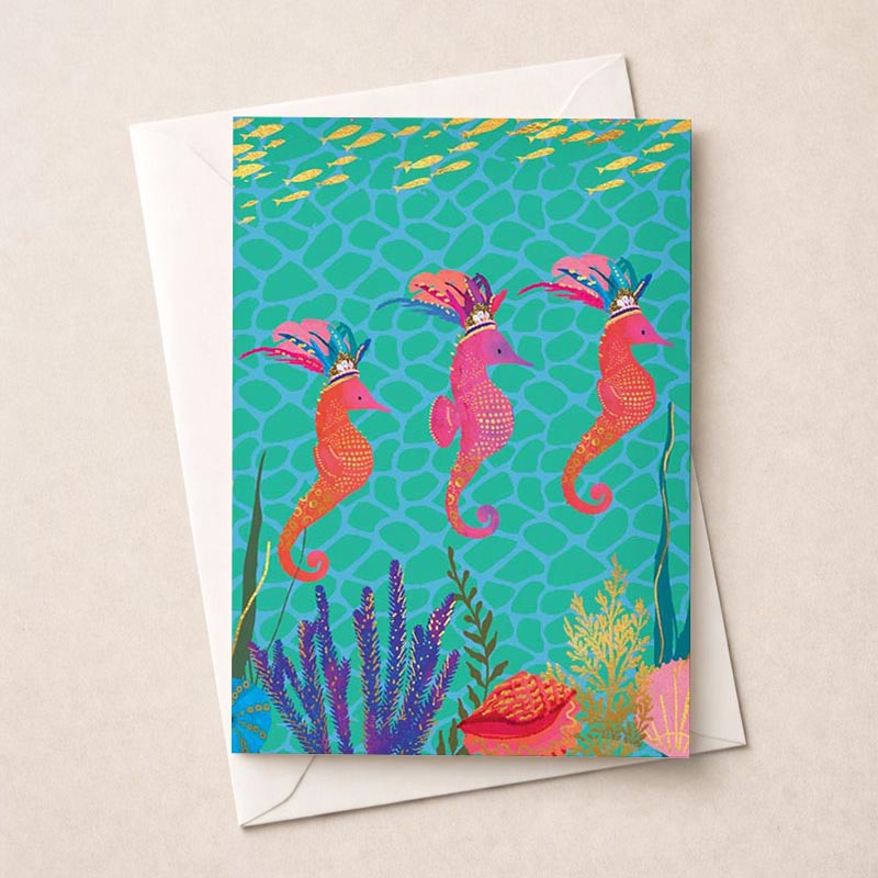 Vibrant seahorses swimming in ocean on greetings card. Perfect for nature lovers and ocean enthusiasts. Brighten someone's day with this charming design.