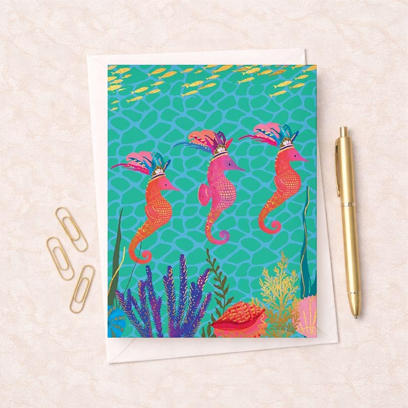 Vibrant seahorses swimming in ocean on greetings card. Perfect for nature lovers and ocean enthusiasts. Brighten someone's day with this charming design.