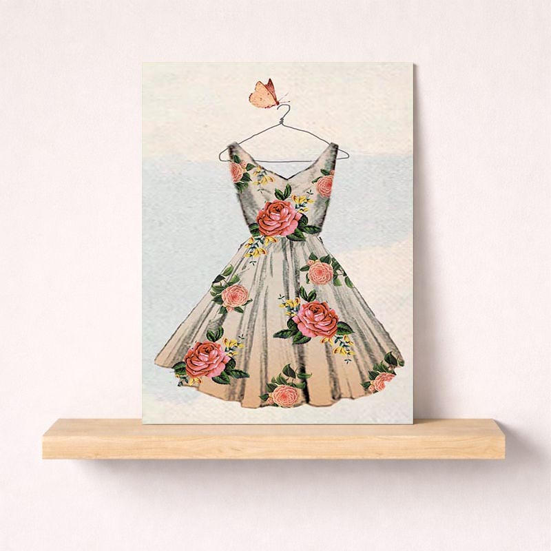 Elegant dress with roses and butterfly on greetings card. Ideal for sending well wishes or birthday greetings.