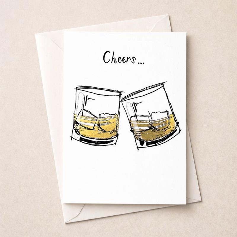 Charming greetings card with two glasses of whiskey clinking. Perfect for celebrating special occasions with friends and family. Bring a smile to someone's face!