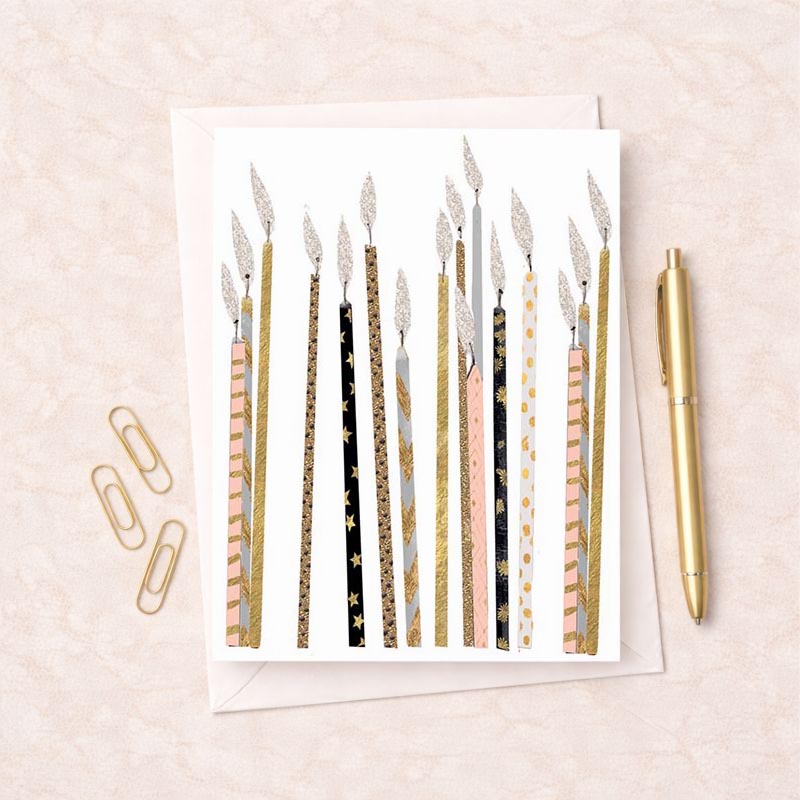 Charming gold and pink candle design greetings card, perfect for birthdays and special occasions. Warm and sophisticated.