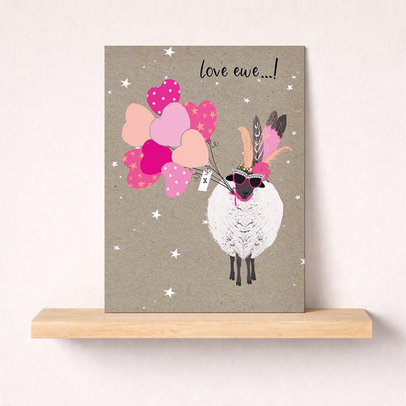 Cheerful greetings card with sheep in sunglasses and balloons, perfect for spreading joy and love.
