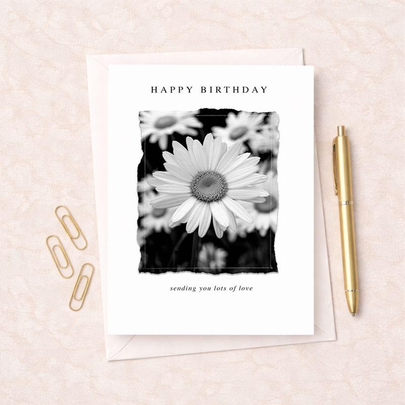 Classic black and white floral greetings card with "Happy Birthday" text. Perfect for heartfelt messages.
