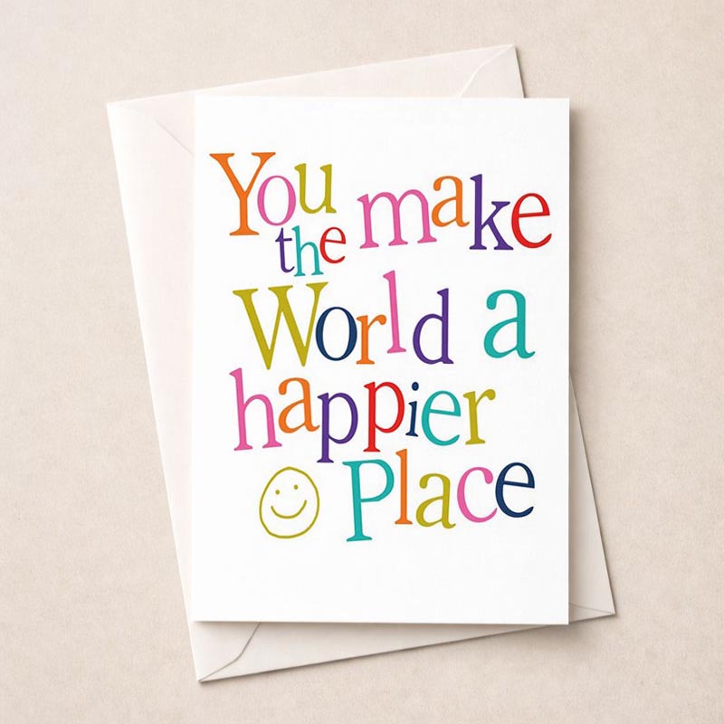 Cheerful greetings card with quote "you make the world a happier place", colourful typography, and smiley face design. Spread positivity and love!