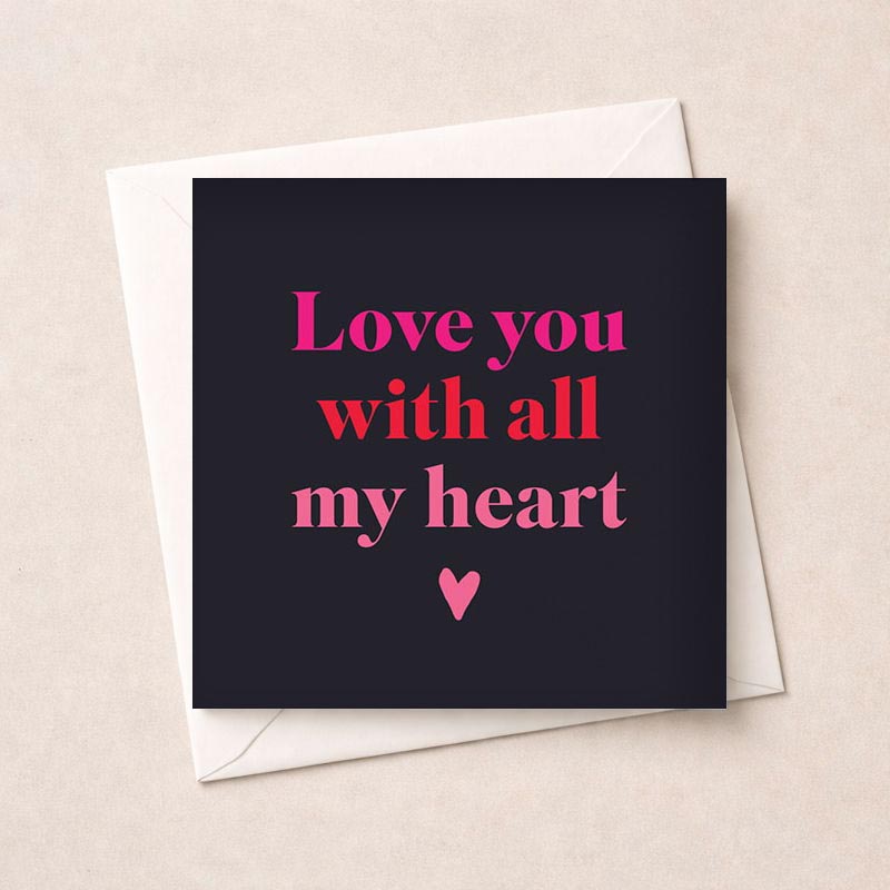 Heartfelt greetings card with pink heart on black background and "Love you with all my heart" message. Express deep love and appreciation.