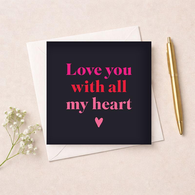 Heartfelt greetings card with pink heart on black background and "Love you with all my heart" message. Express deep love and appreciation.
