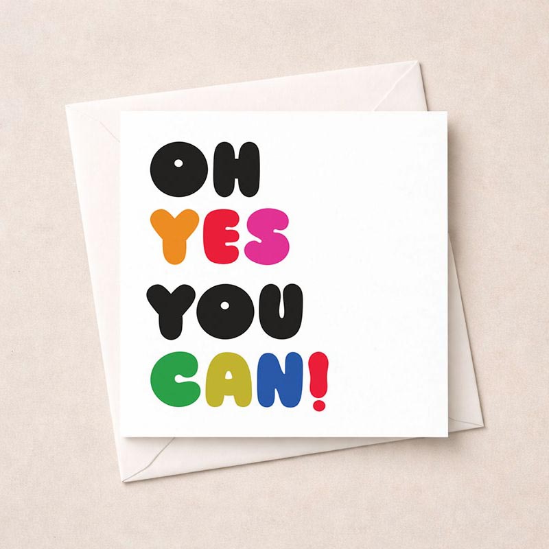 Bright greetings card with colorful "YES YOU CAN!" message, exuding encouragement and motivation for all ages and occasions.