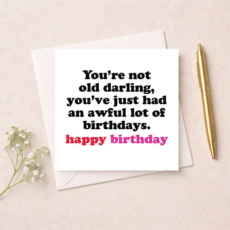 Birthday card with quote: "You're not old darling, you've just had a lot of birthdays." Elegant black and white design.
