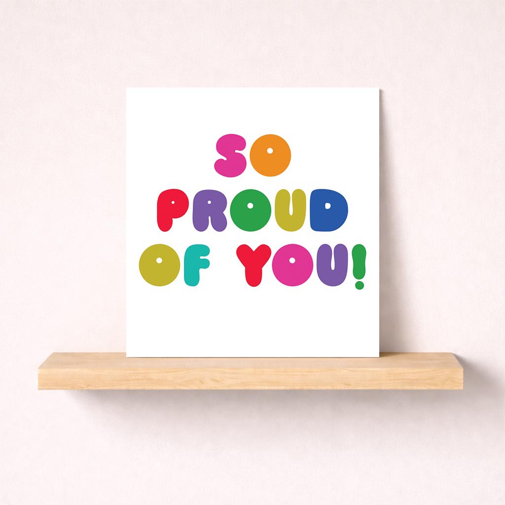 Colorful "PROUD OF YOU!" greetings card radiates warmth and pride, perfect for celebrating achievements and milestones.