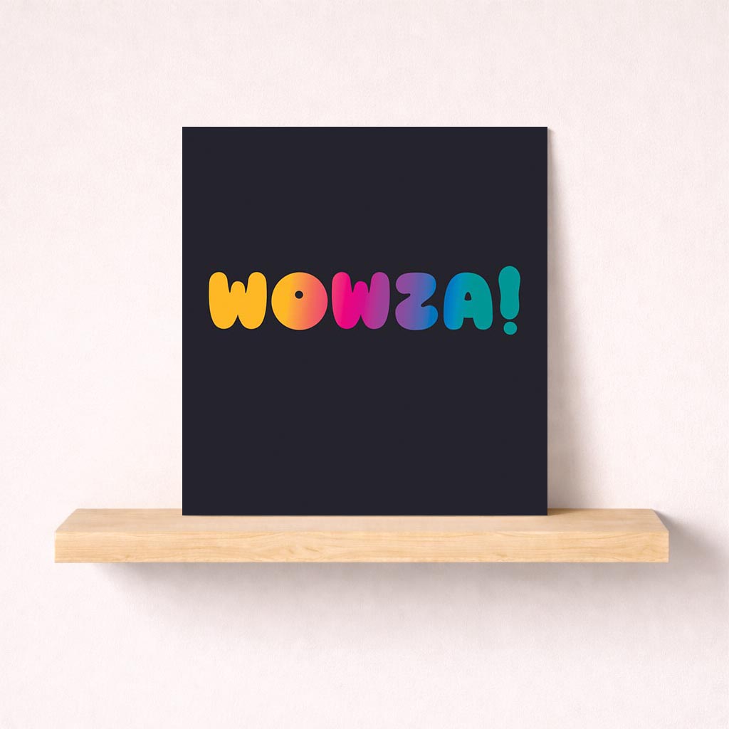 Colorful "WOWZA!" card on dark background, exuding excitement and positivity. Perfect for all ages and occasions.