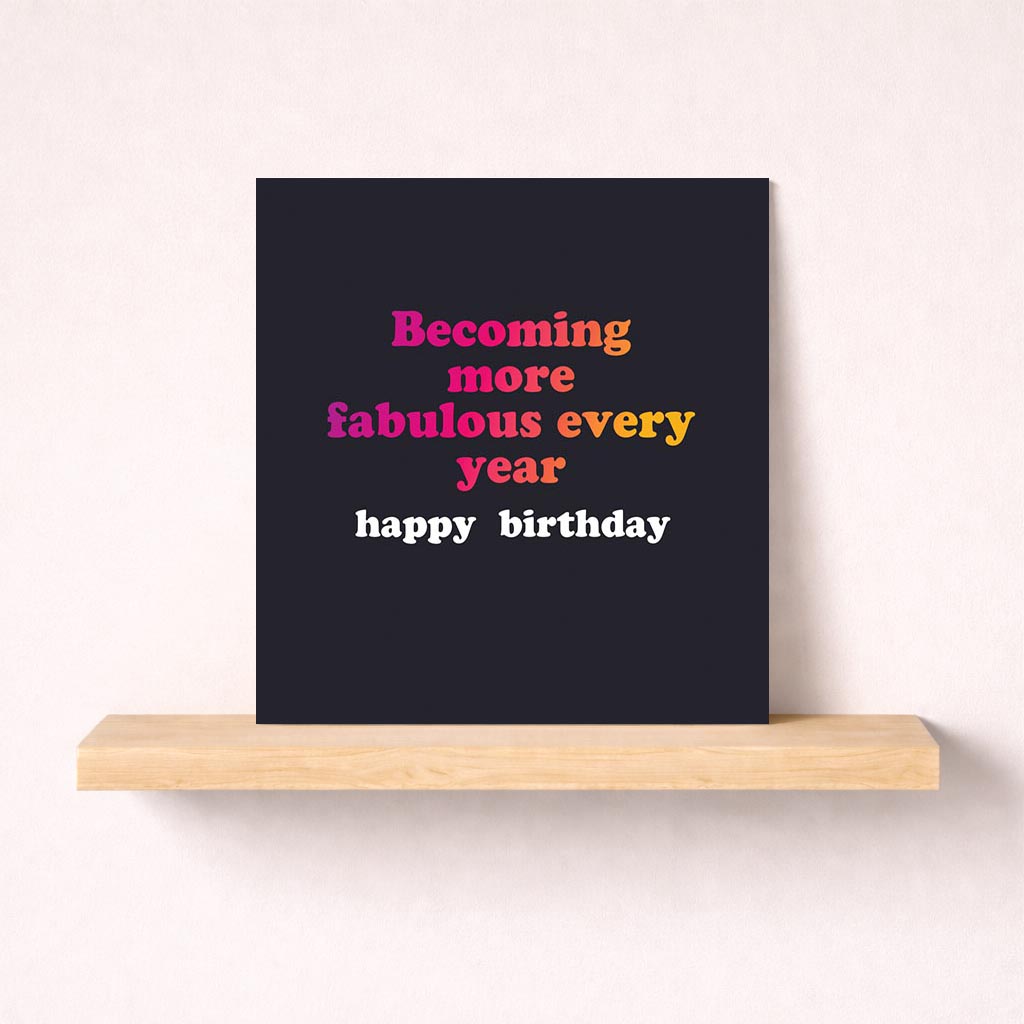 Colorful birthday card with cake and candles, text reads "Becoming more fabulous every year happy birthday" - perfect for spreading joy and love.