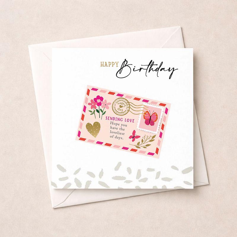 Pink birthday card with butterfly and flowers, ideal for sending warm wishes to someone special.