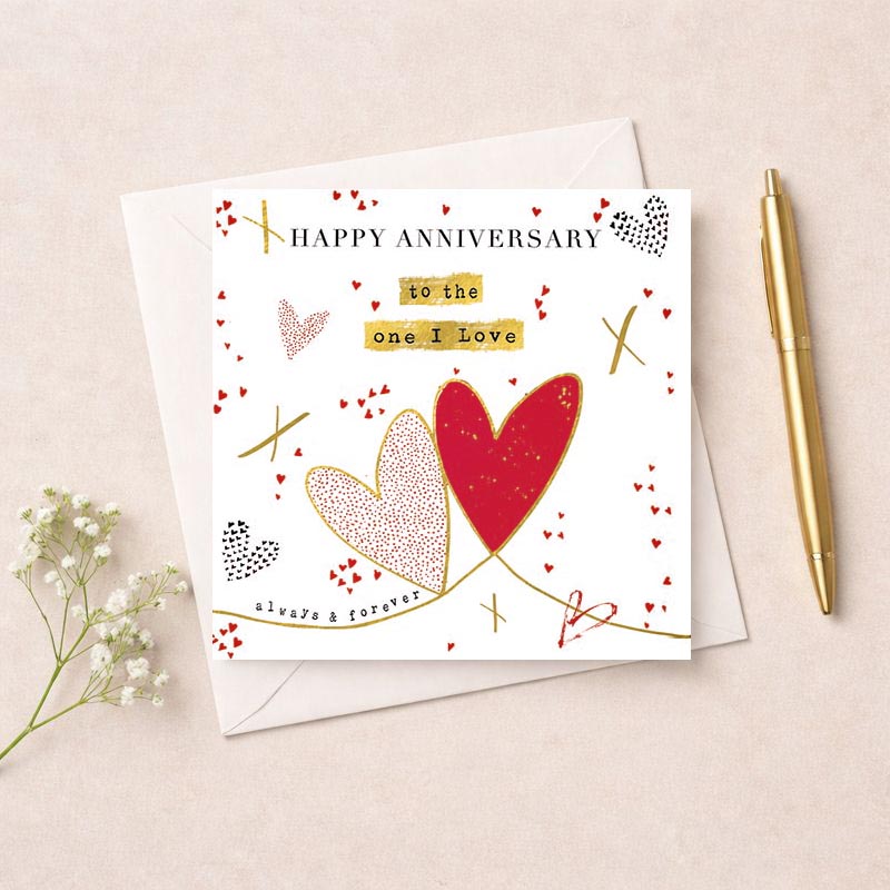 White greetings card with two hearts, perfect for expressing love on anniversaries or special occasions. Classic and elegant design suitable for all ages.