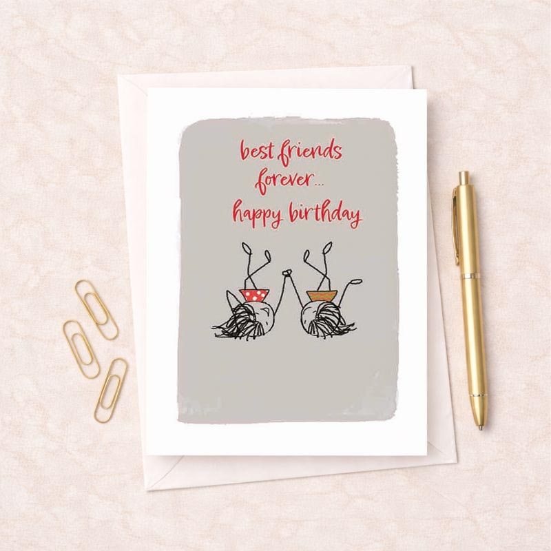 Colorful balloons floating against a bright blue sky.