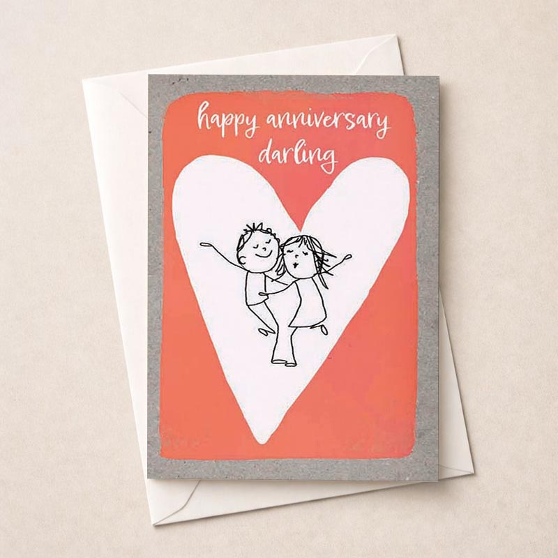 A heartwarming card with a couple hugging in front of a heart, saying "happy anniversary darling". Ideal for expressing love and celebrating special moments.