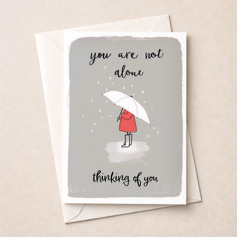 Heartfelt card with message "you are not alone, thinking of you" for support during tough times.