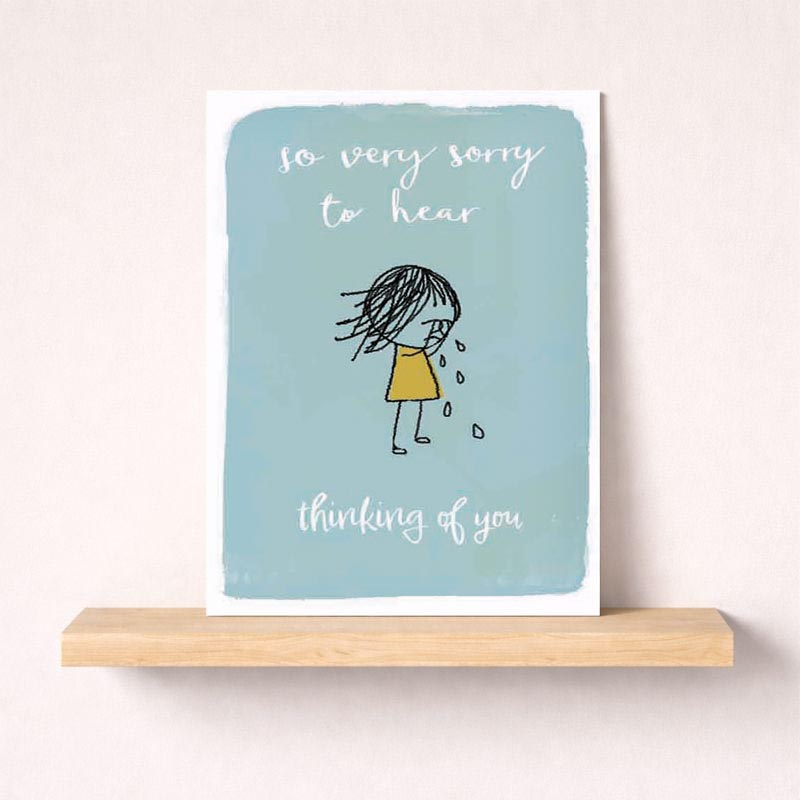 Sympathy greetings card with sad girl drawing - "So very sorry to hear, thinking of you." Blue background for comfort and support.