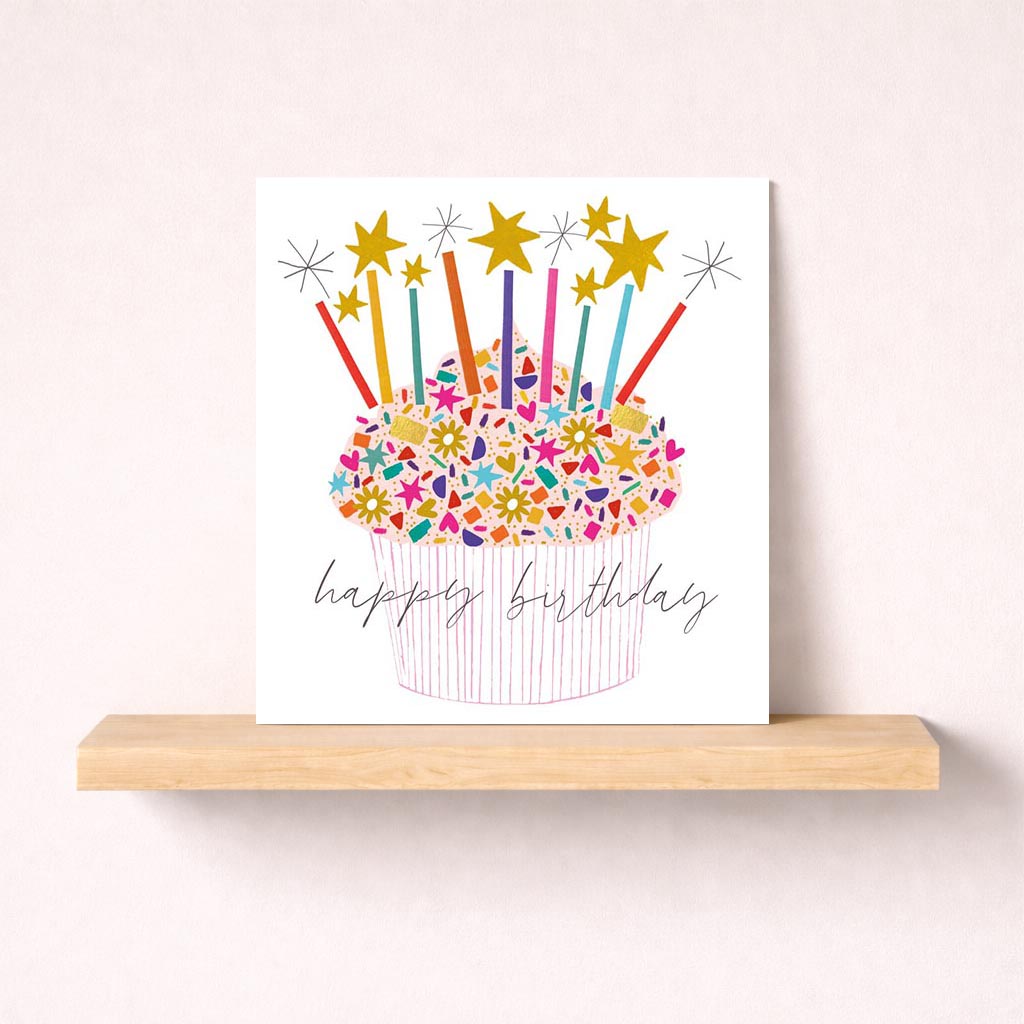 colourful cupcake-themed greetings card with flickering candles and twinkling stars, perfect for birthdays.