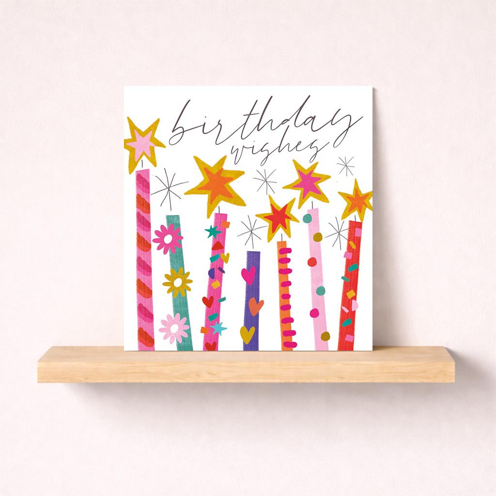 colourful birthday card with candles, stars, and flowers, perfect for spreading joy and well wishes.