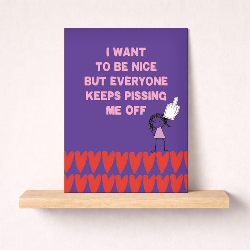 Colorful greetings card with girl in front of hearts backdrop reading "I WANT TO BE NICE BUT EVERYONE KEEPS PISSING ME OFF" - perfect for those who appreciate humor and honesty.