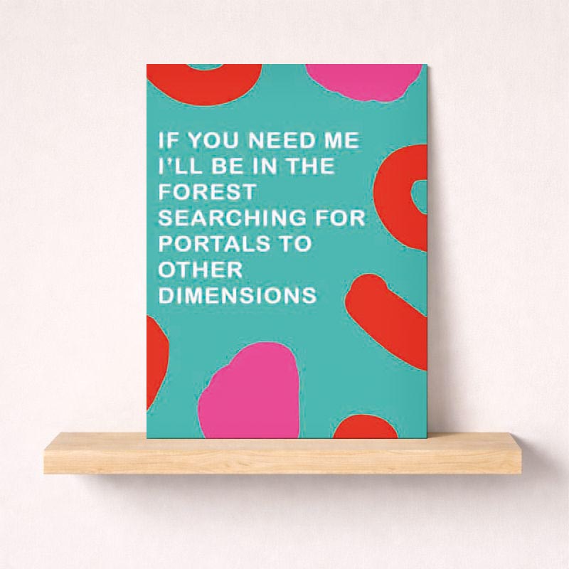 Soothing blue card with pink and red pattern, message: "IF YOU NEED ME I'LL BE IN THE FOREST SEARCHING FOR PORTALS TO OTHER DIMENSIONS". Ideal for nature lovers and dreamers.