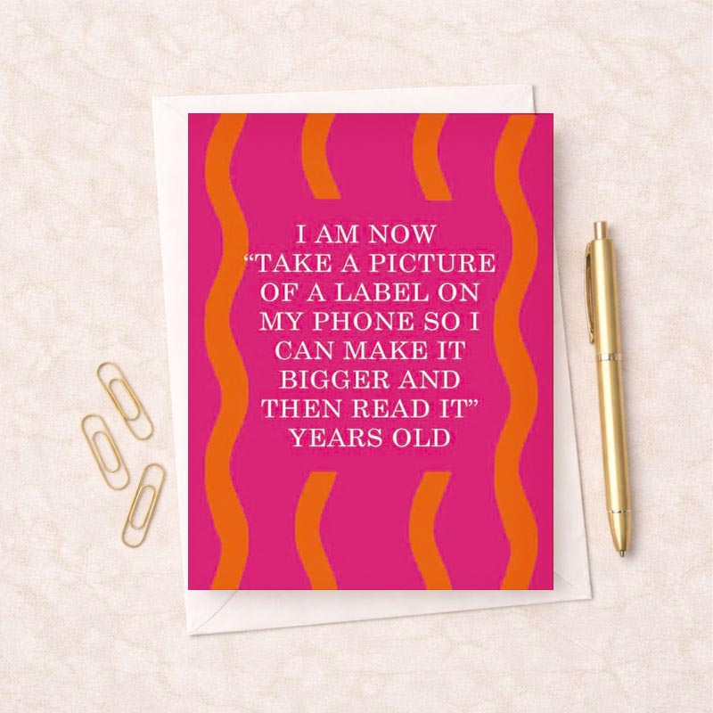 Vibrant pink and orange greetings card for milestone birthdays, with empowering message: "I AM NOW YEARS OLD.