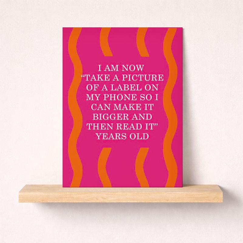 Vibrant pink and orange greetings card for milestone birthdays, with empowering message: "I AM NOW YEARS OLD.