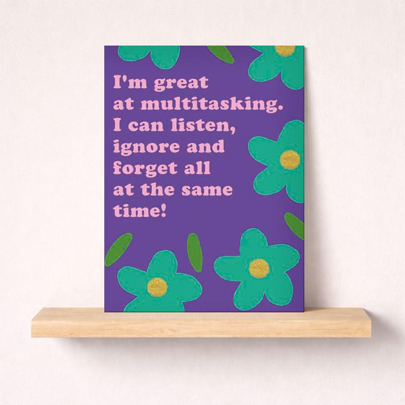 Colorful flower-themed greetings card with humorous quote: "I'm great at multitasking. I can listen, ignore and forget all at the same time!" Perfect for busy friends and family.